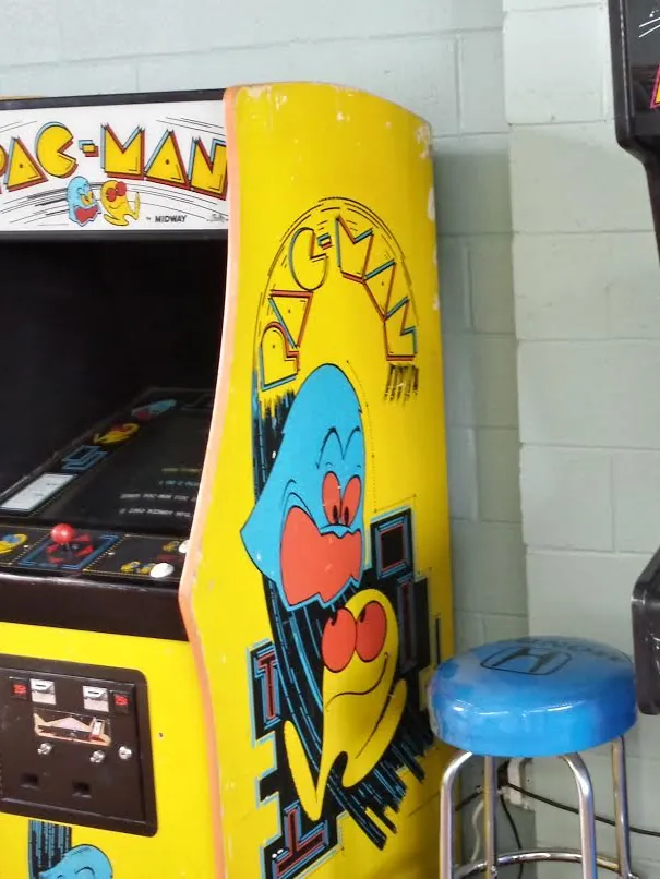 A Pac-Man arcade cabinet in the waiting room at Pete's